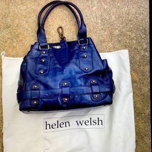 Medium practical shiny blue leather shoulder bag.